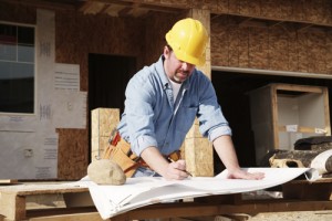 a man creating a construction plan